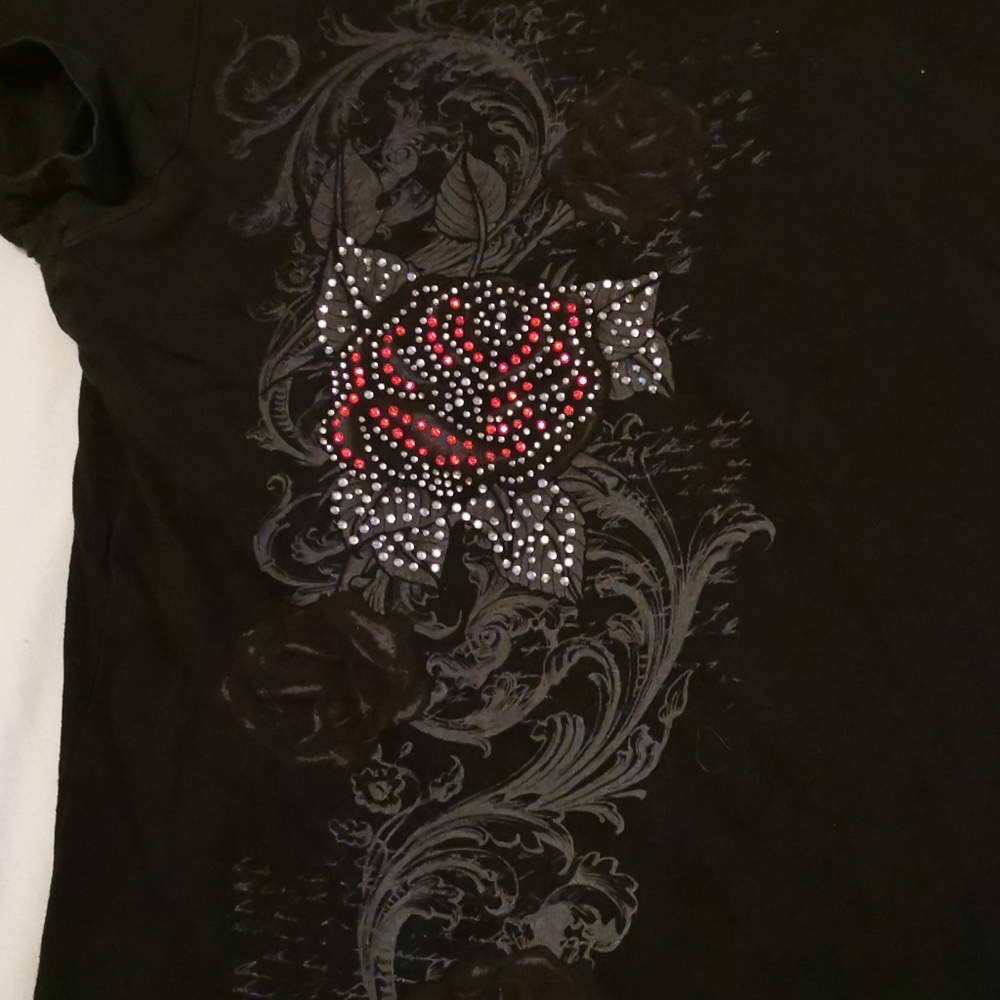 Black top with gemmed floral decal